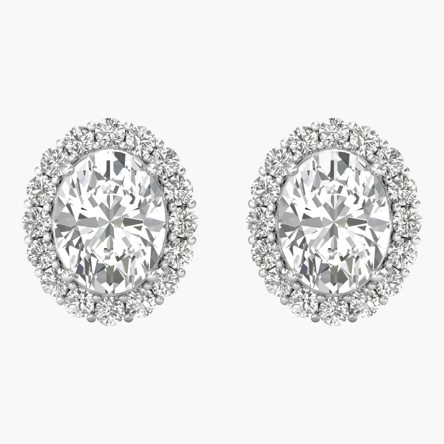 Pair of diamond earrings on a white background