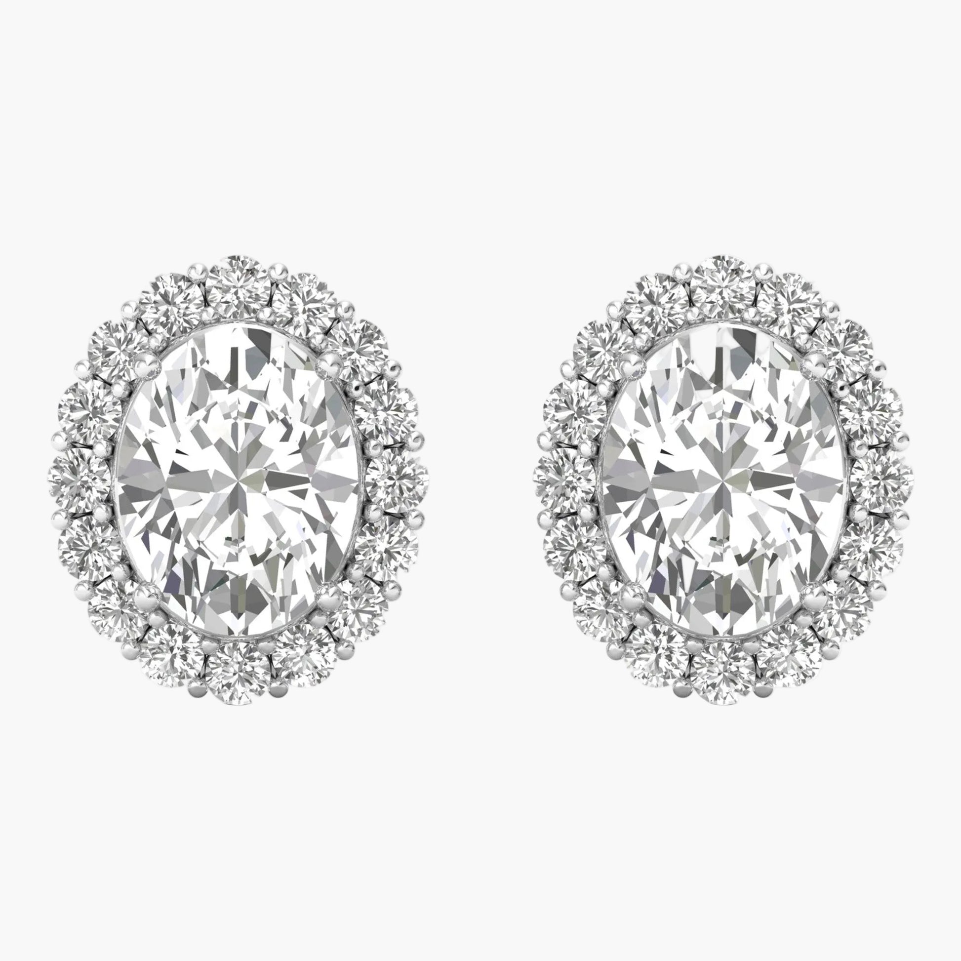 Pair of diamond earrings on a white background