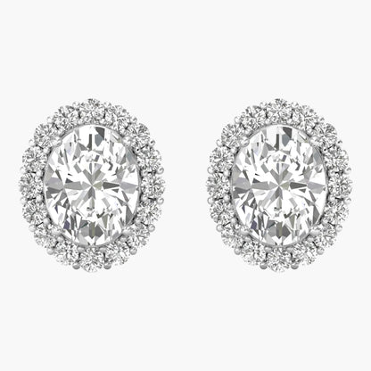 Pair of diamond earrings on a white background