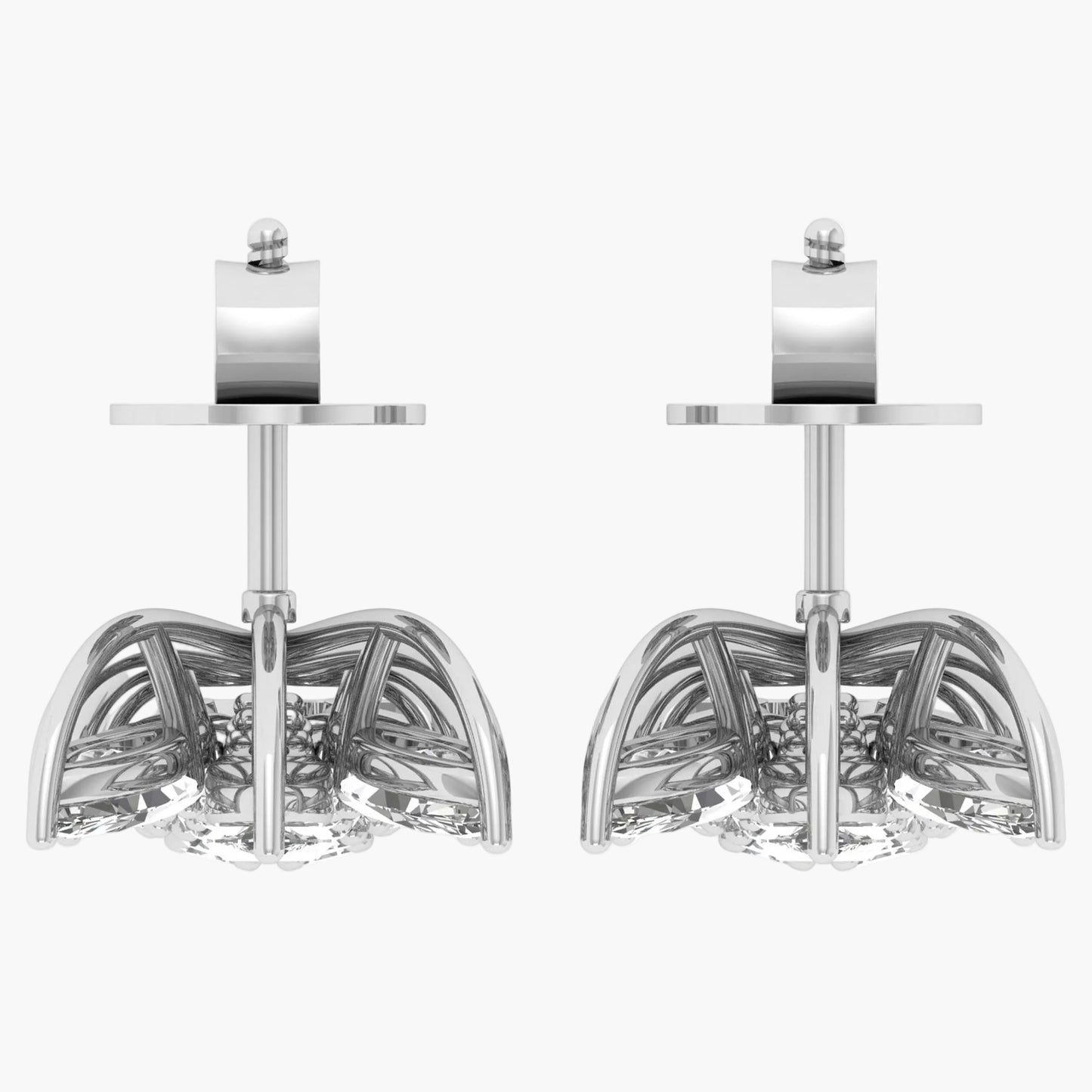 Pair of silver earrings with intricate designs on a white background