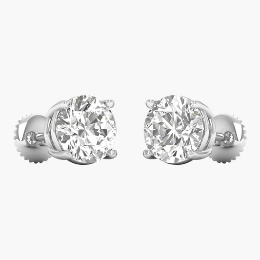 Pair of diamond stud earrings on a white background