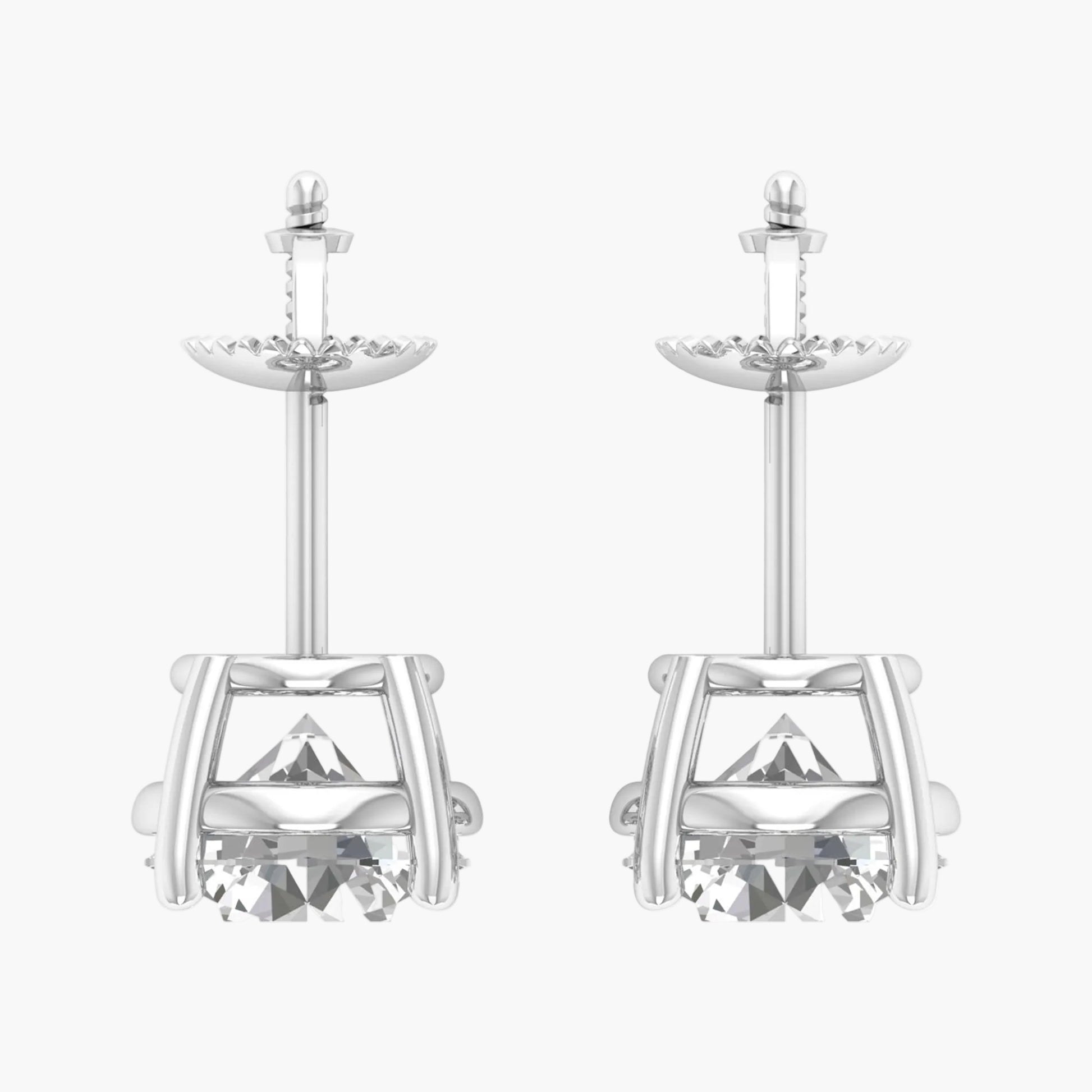 Pair of silver earrings with crystal accents on a white background