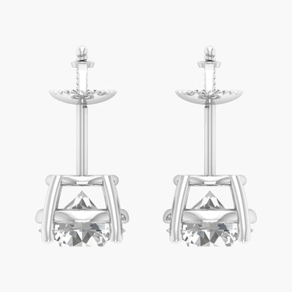 Pair of silver earrings with crystal accents on a white background