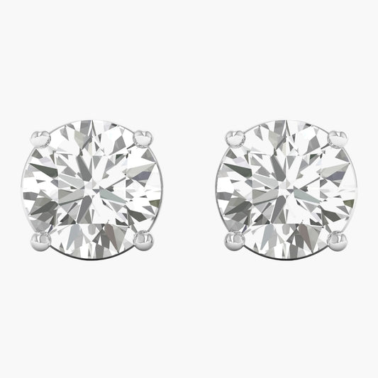 Pair of diamond stud earrings on a white background