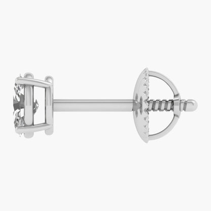 Silver earring on a white background