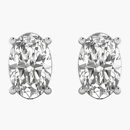 Pair of diamond stud earrings on a white background