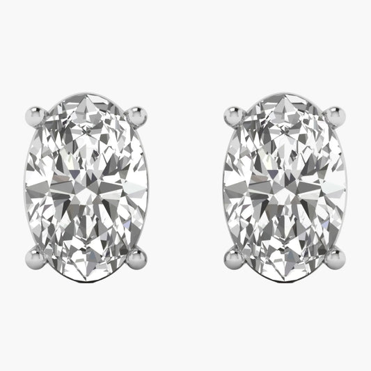 Pair of diamond stud earrings on a white background