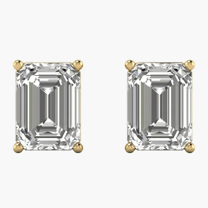 Pair of diamond earrings with gold prongs on a white background