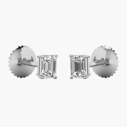 Diamond earrings with emerald-cut stones on a white background