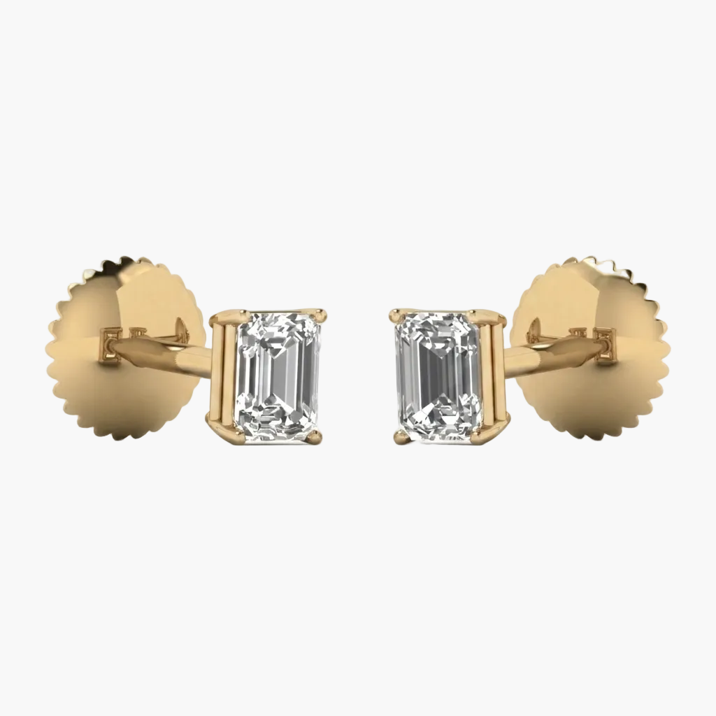Gold earrings with emerald-cut diamonds on a white background