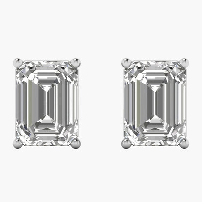 Pair of diamond stud earrings on a white background