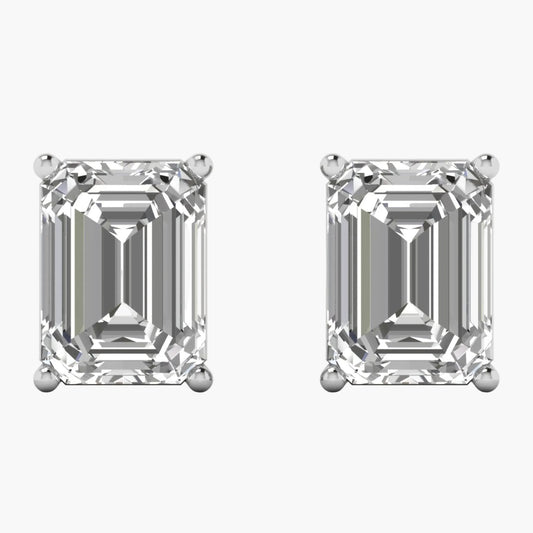 Pair of diamond stud earrings on a white background