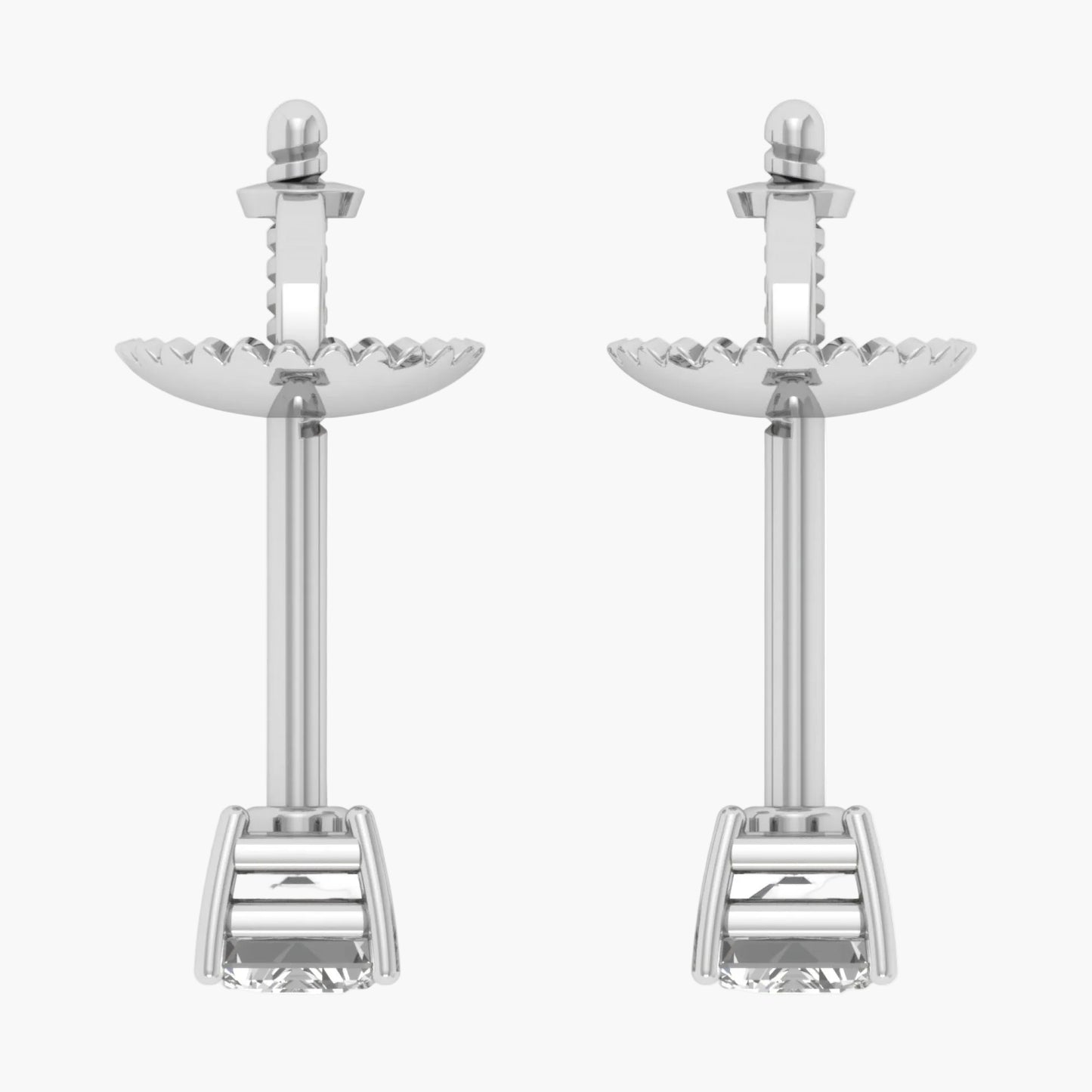 Pair of silver earrings with intricate designs on a white background
