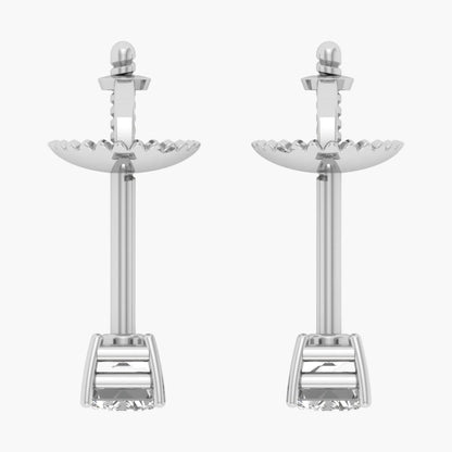Pair of silver earrings with intricate designs on a white background
