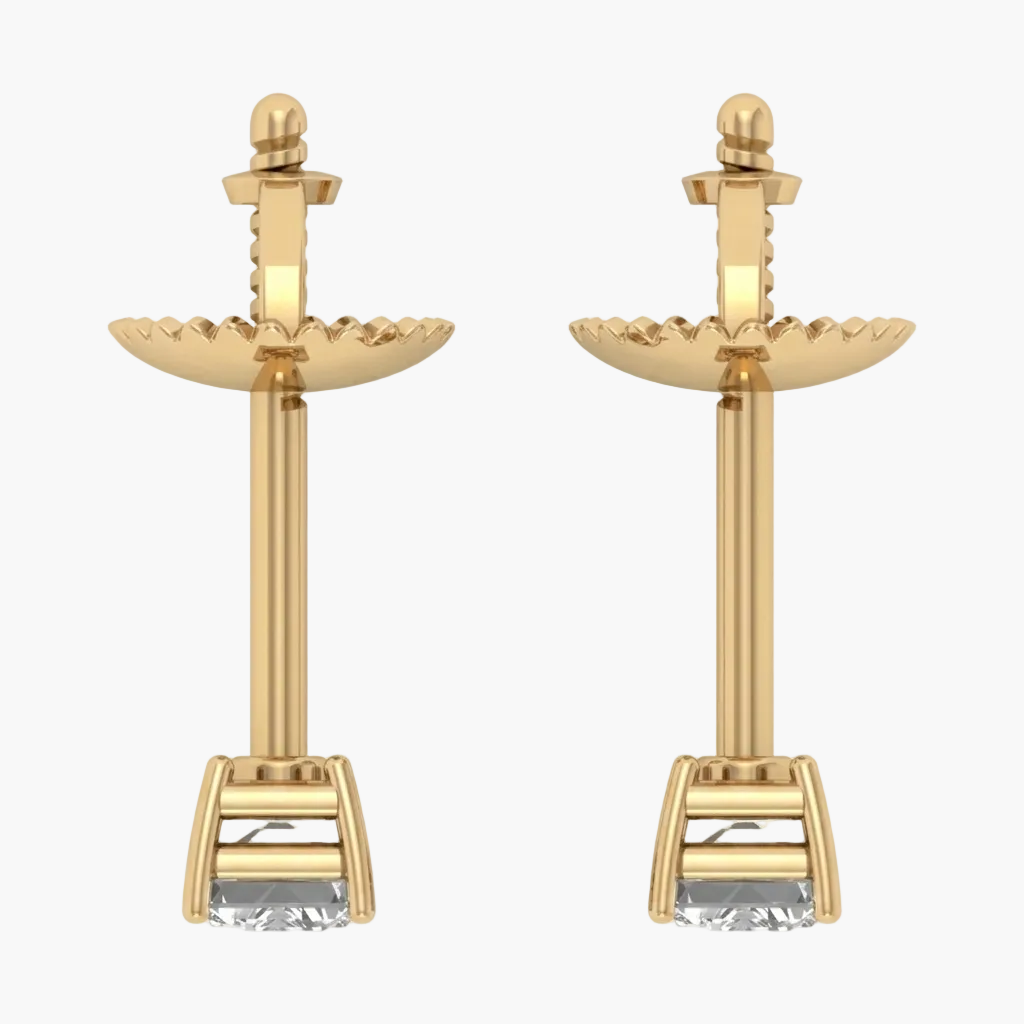 Pair of gold earrings with intricate designs on a white background
