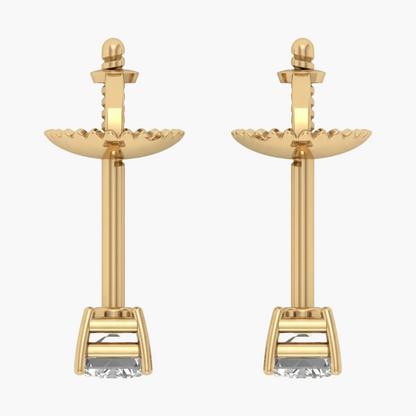 Pair of gold earrings with intricate designs on a white background