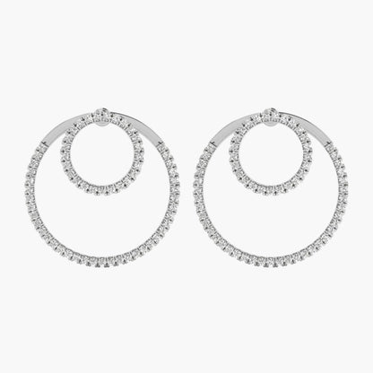Pair of silver hoop earrings with clear stones on a white background