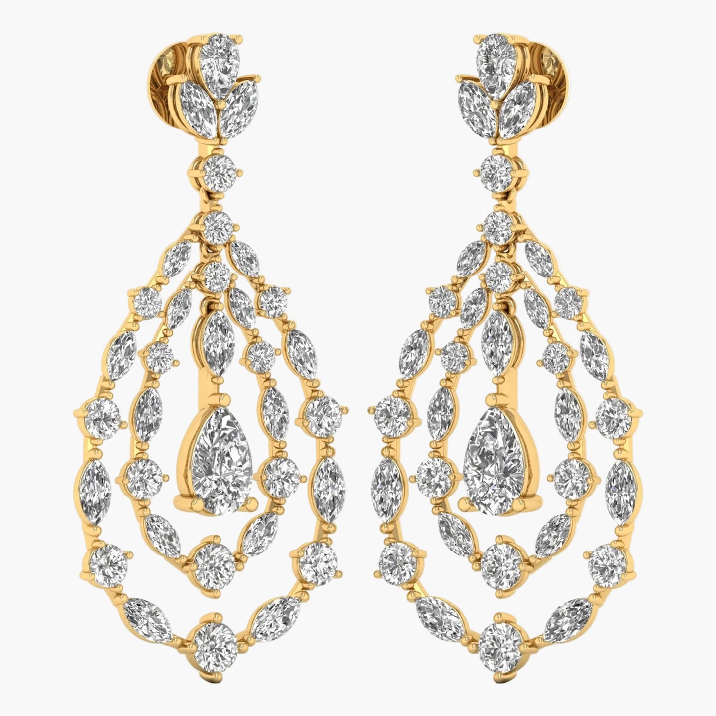 Gold and diamond earrings on a white background