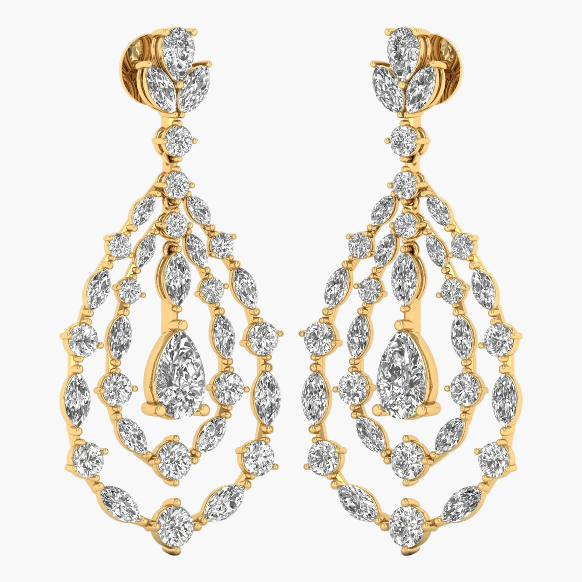 Gold and diamond earrings on a white background