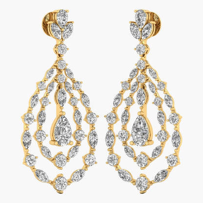 Gold and diamond earrings on a white background