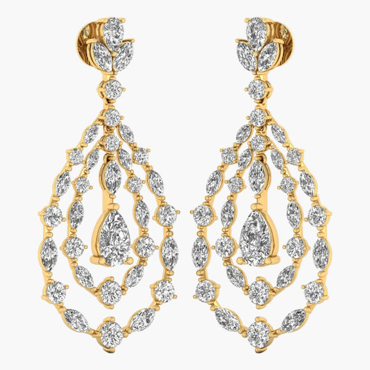 Gold and diamond earrings on a white background