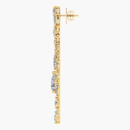Gold and silver earring on a white background
