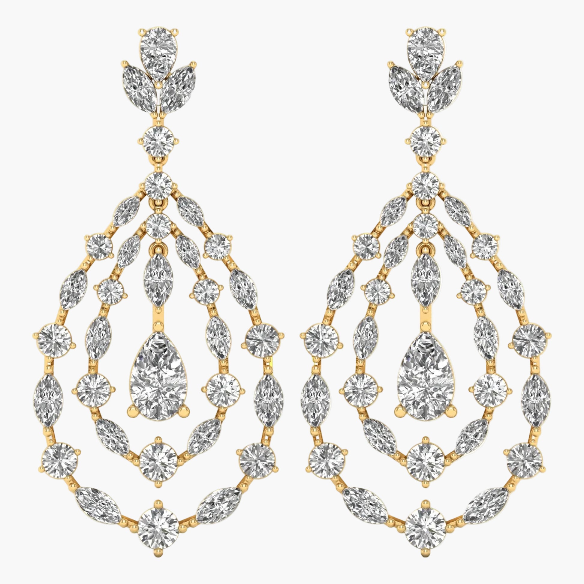 Gold and diamond earrings on a white background