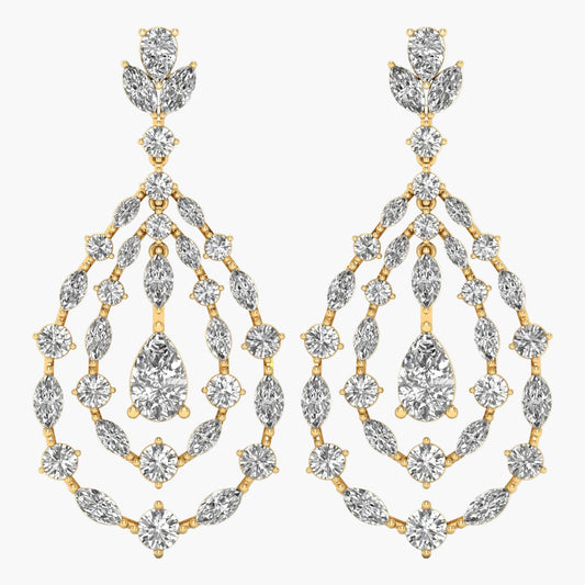 Gold and diamond earrings on a white background