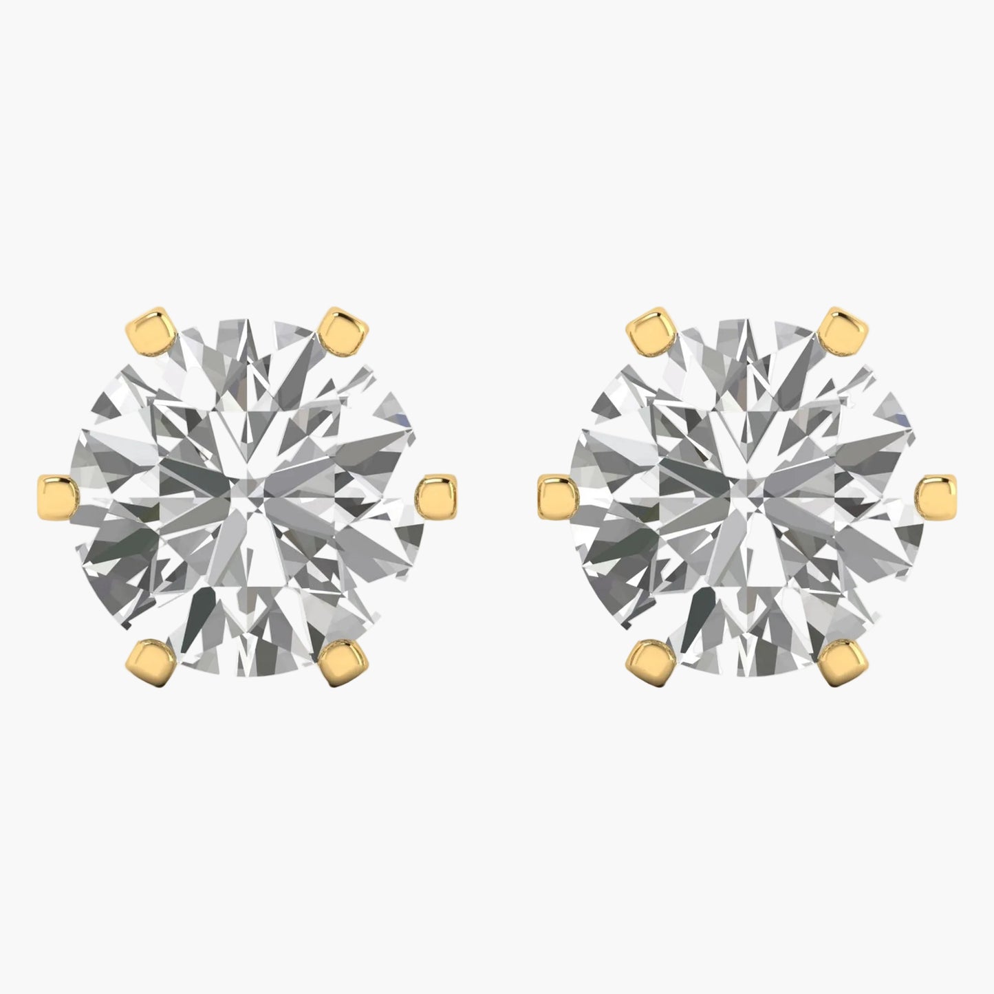 Pair of diamond stud earrings with gold prongs on a white background
