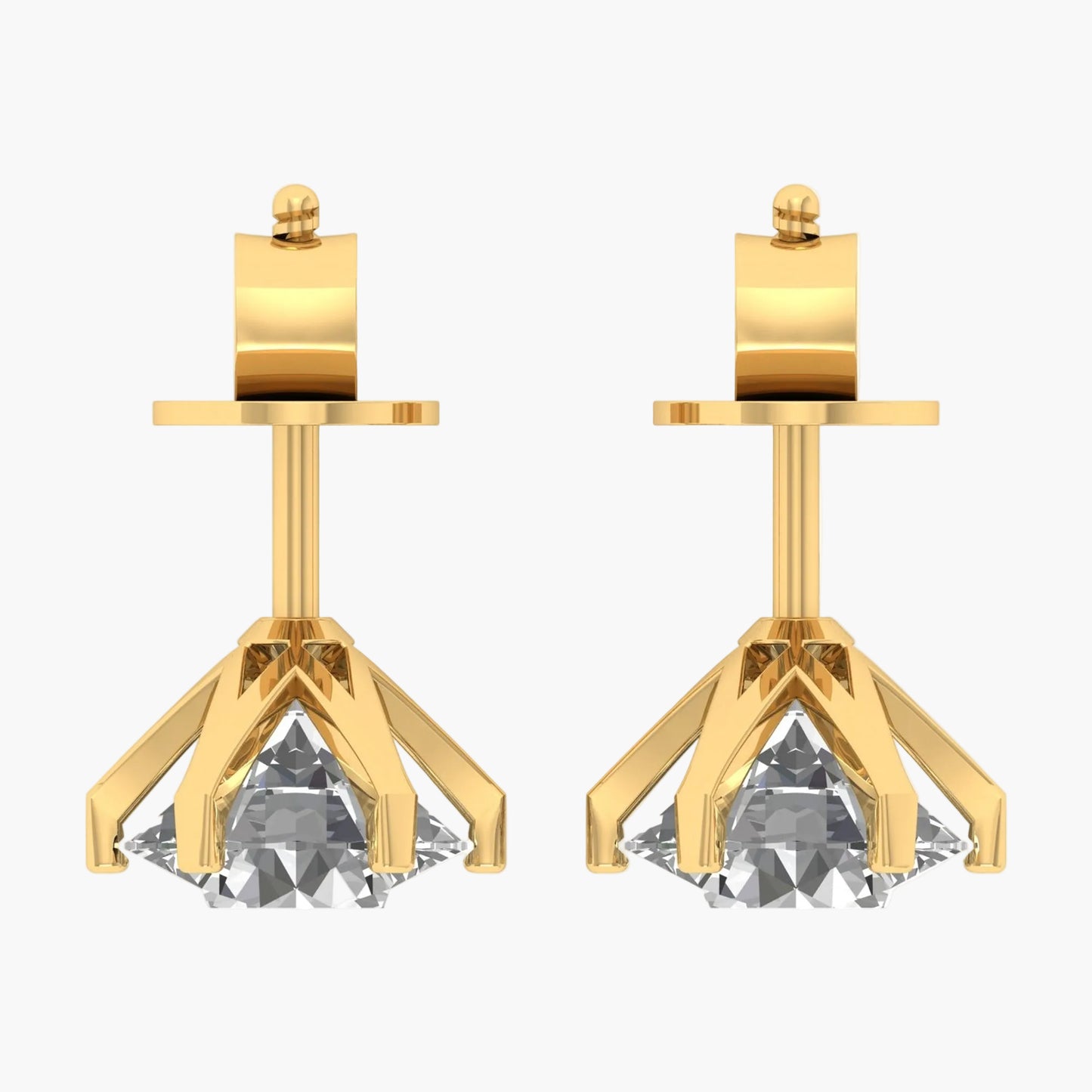 Gold earrings with clear gemstones on a white background