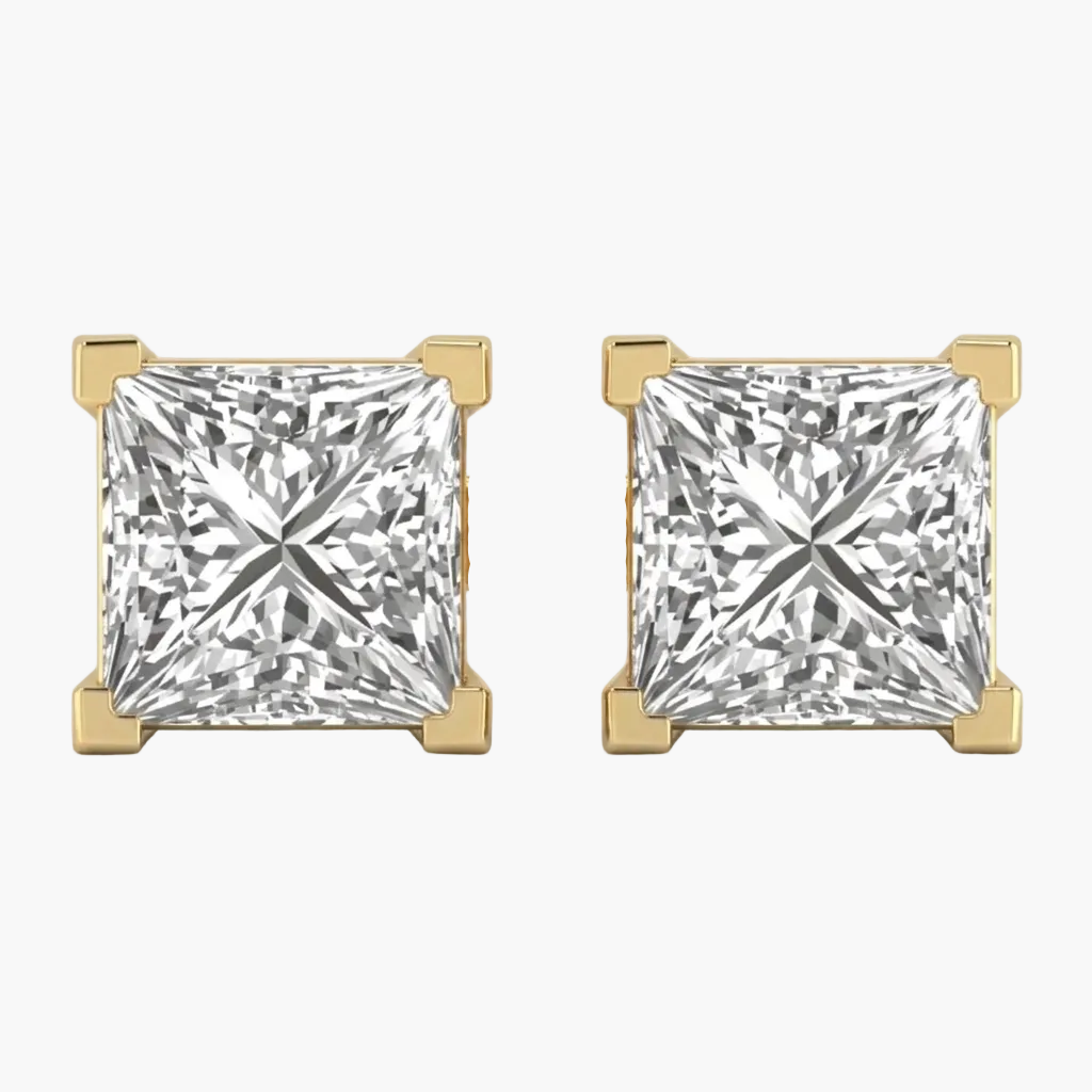 Pair of gold earrings with square-cut gemstones on a white background