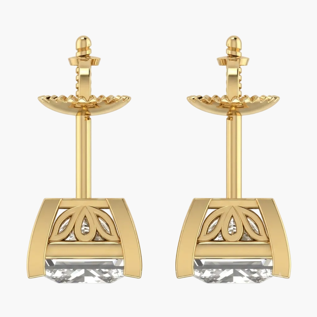 Gold earrings with intricate designs on a white background