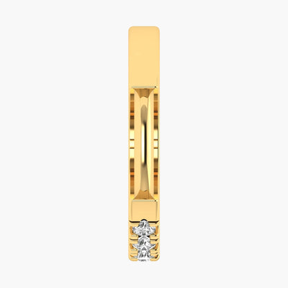 Gold ring with a diamond on a white background