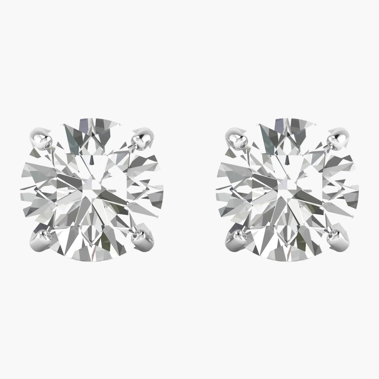 Pair of diamond stud earrings on a white background