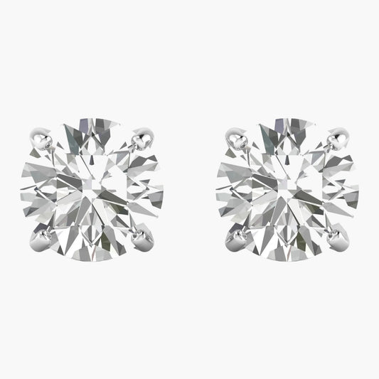 Pair of diamond stud earrings on a white background