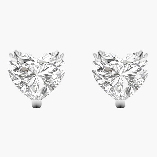 Pair of heart-shaped diamond earrings on a white background