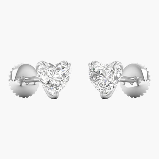 Heart-shaped diamond earrings on a white background