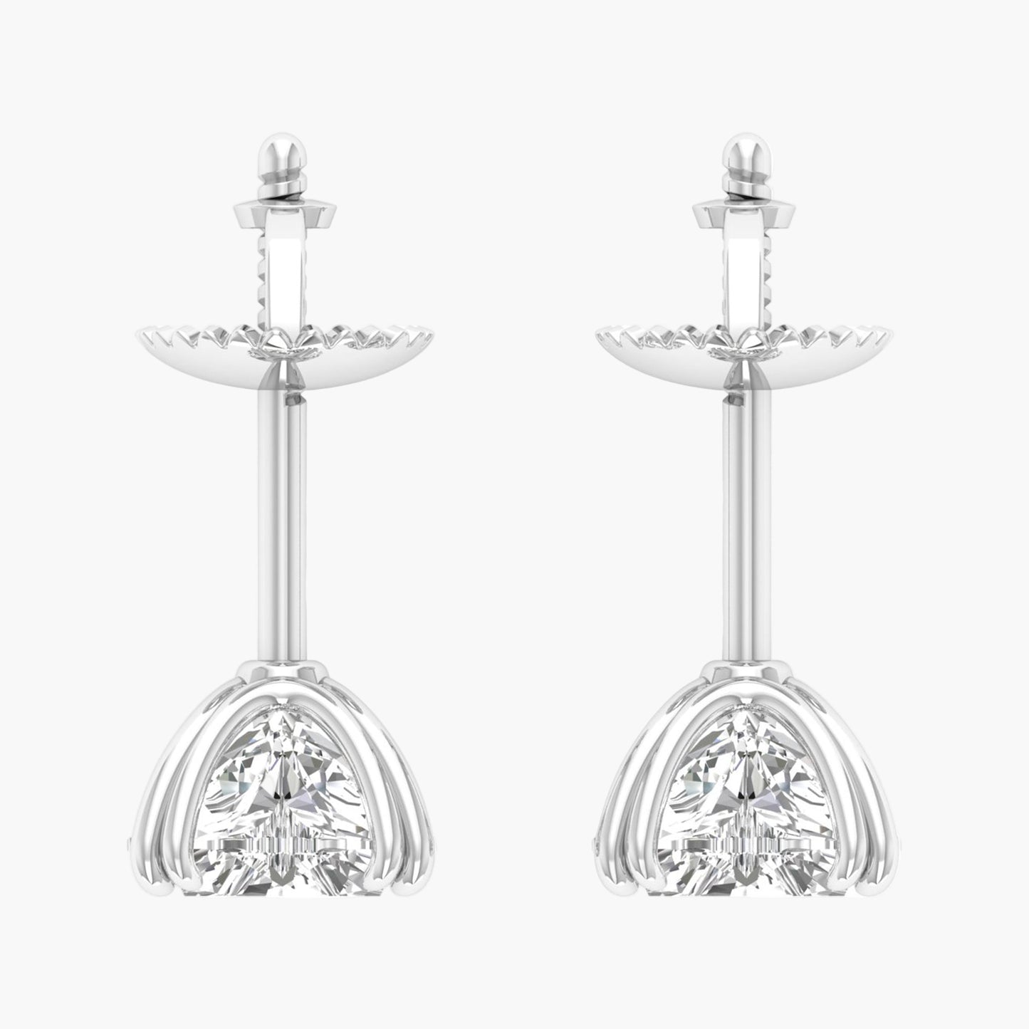Pair of silver earrings with clear gemstones on a white background