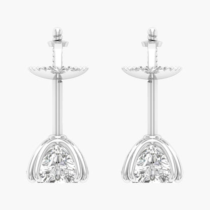 Pair of silver earrings with clear gemstones on a white background