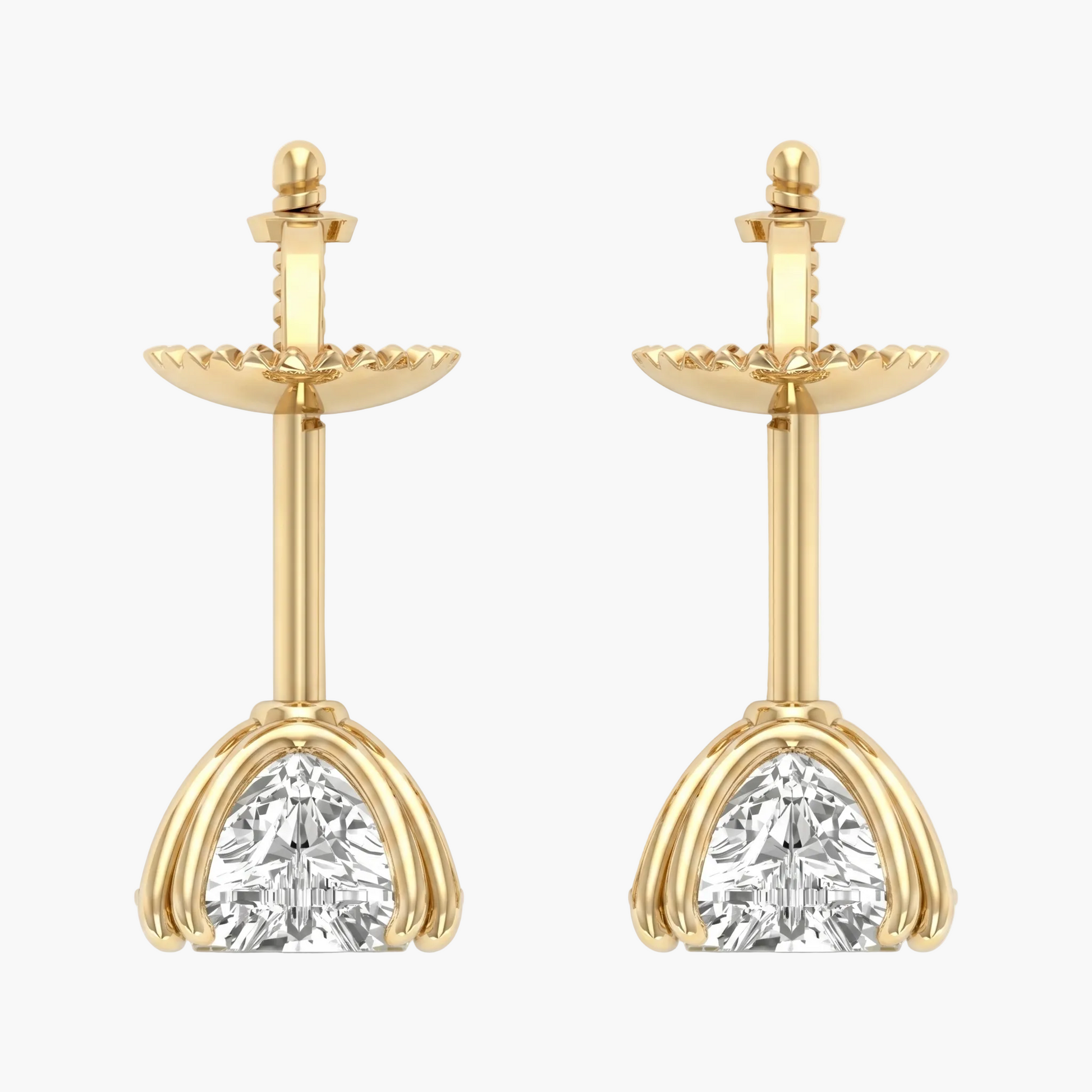 Gold earrings with clear gemstones on a white background