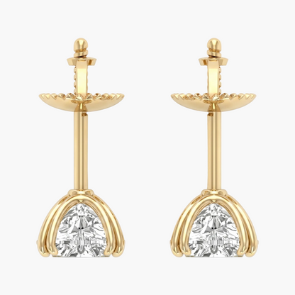 Gold earrings with clear gemstones on a white background