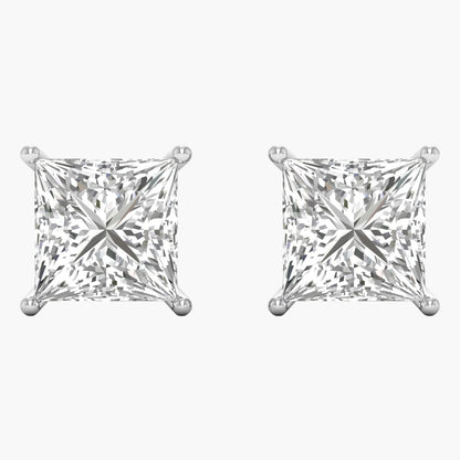 Pair of diamond stud earrings on a white background