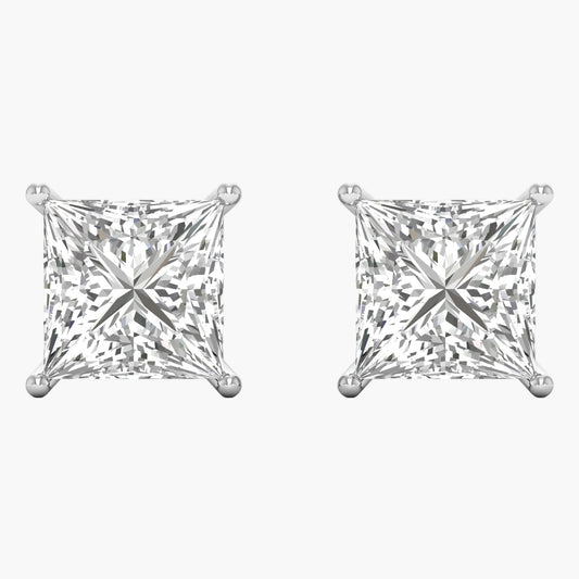 Pair of diamond stud earrings on a white background