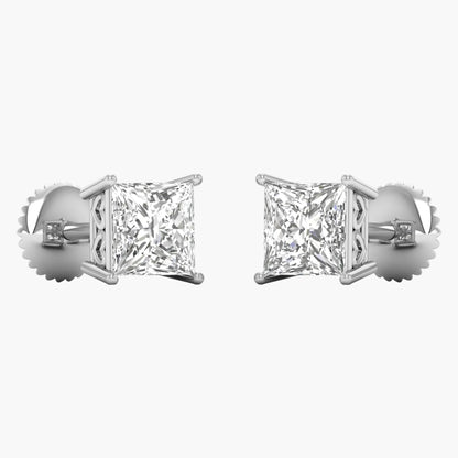 Pair of diamond stud earrings on a white background