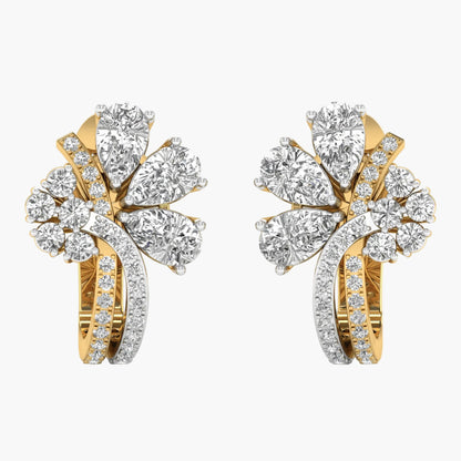 Pair of gold and diamond earrings on a white background