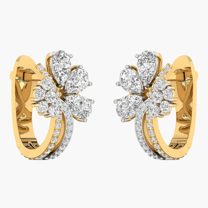 Gold hoop earrings with diamond accents on a white background