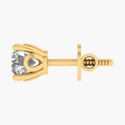 Gold earring with a clear gemstone on a white background