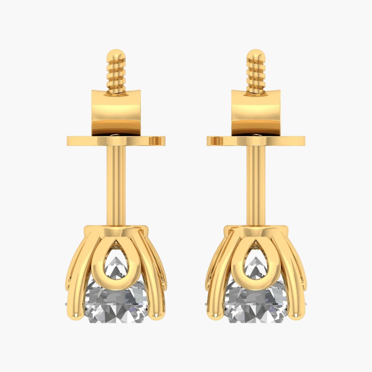 Gold earrings with clear gemstones on a white background