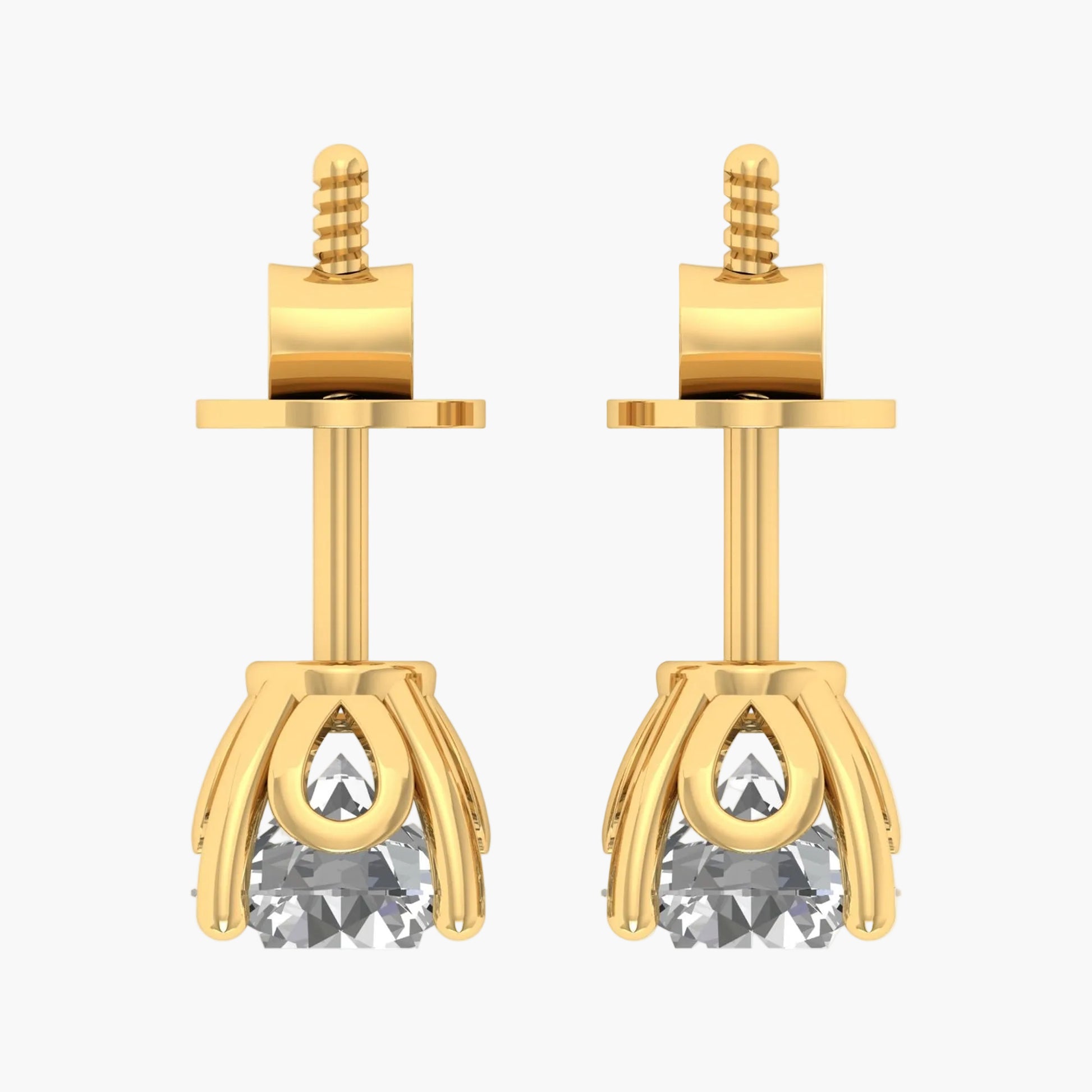 Gold earrings with clear gemstones on a white background