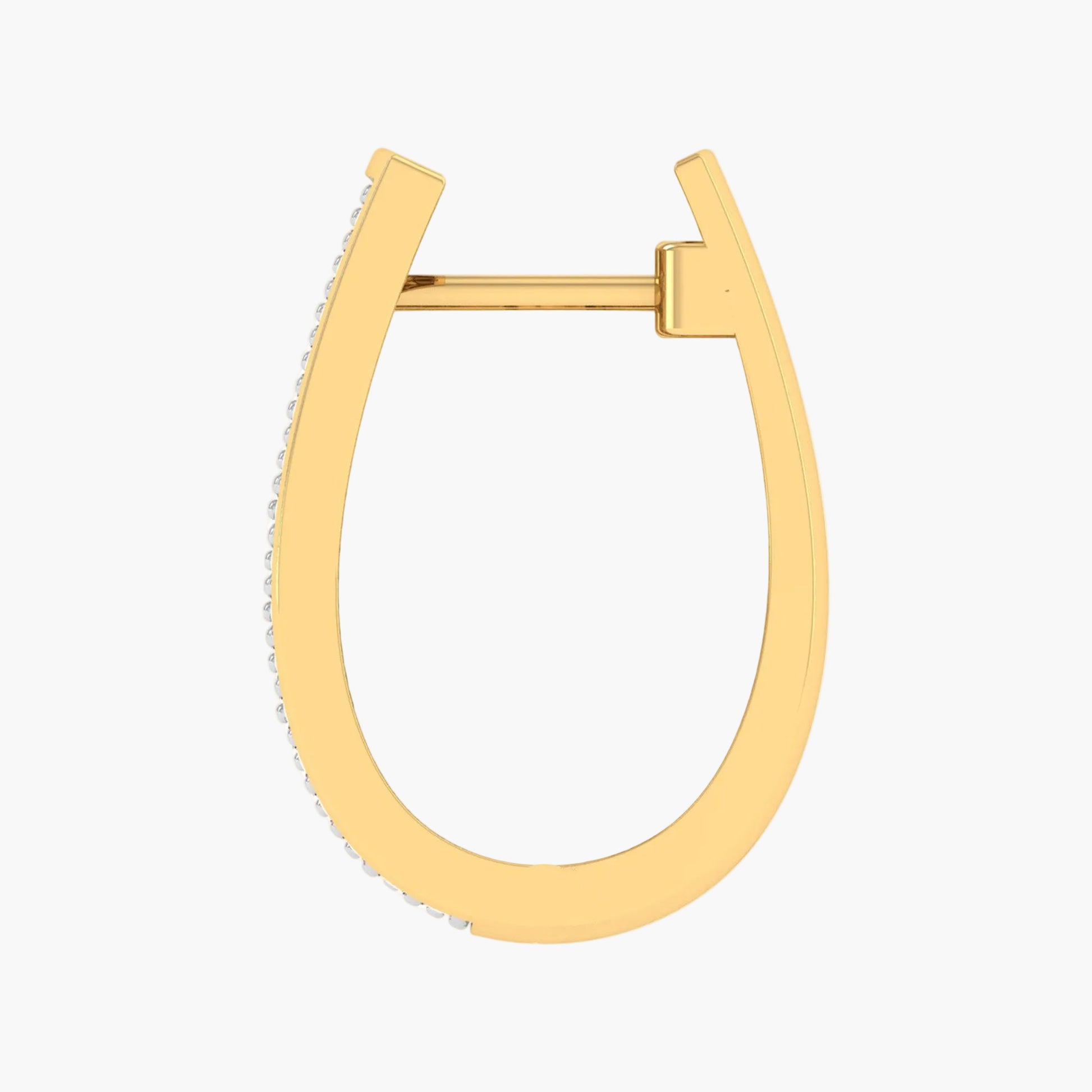 Gold hoop earring on a white background